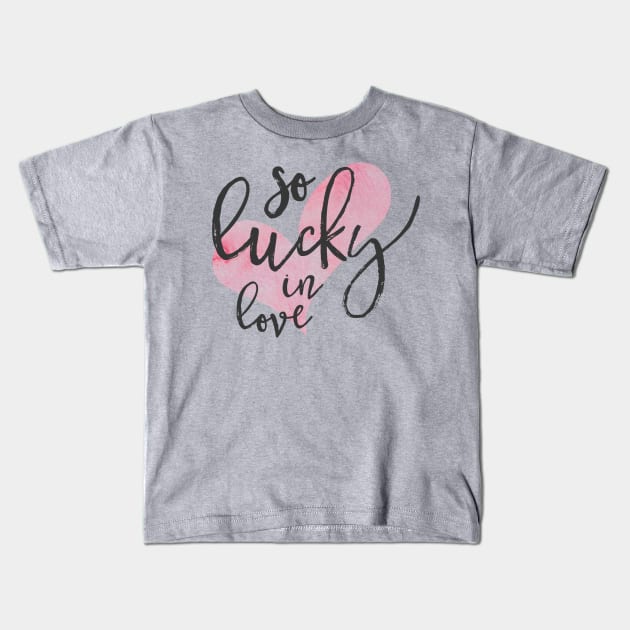 so lucky in love Kids T-Shirt by SoLucky